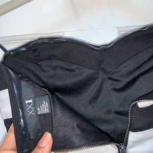 White and black crop top.